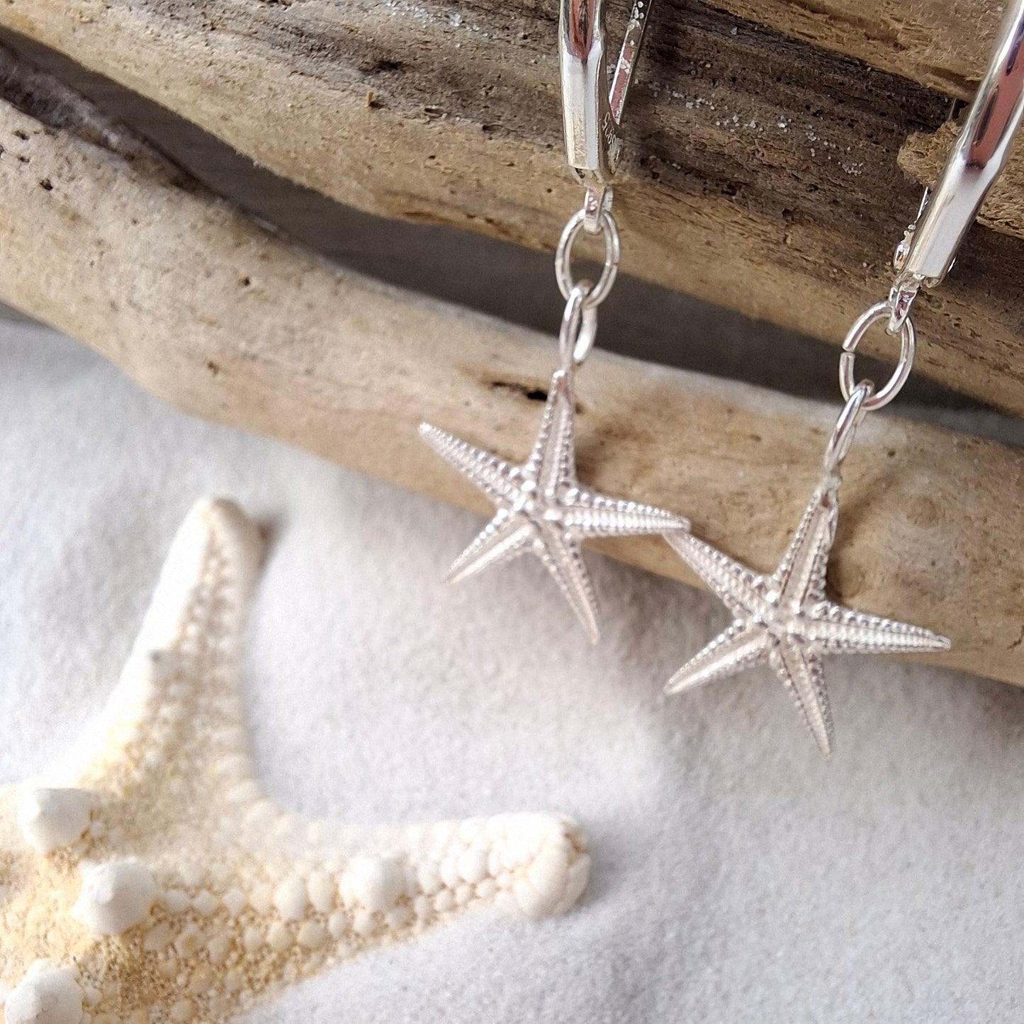 Cast silver starfish dangly earrings | Ocean-Inspired Handmade Jewellery