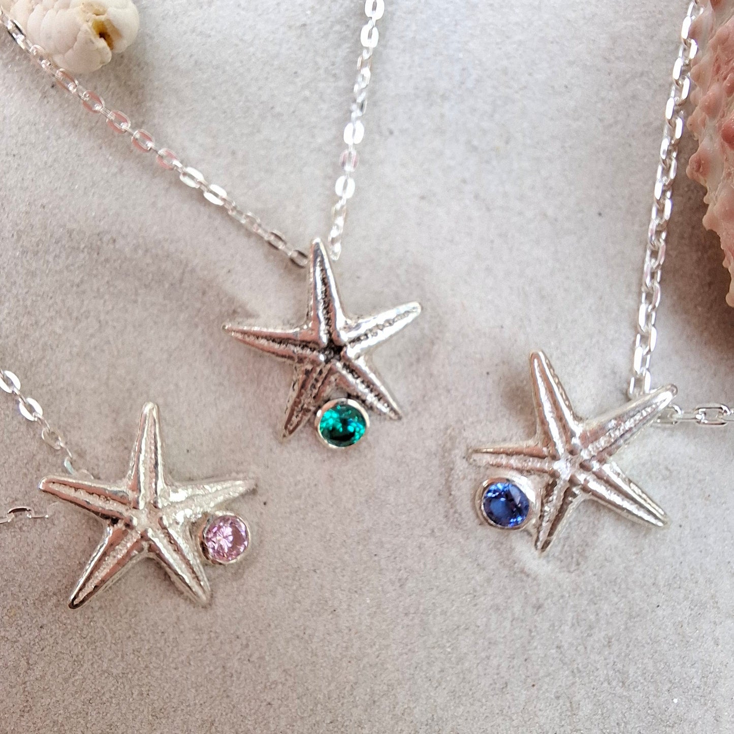 Cast silver starfish pendant with a vibrant cubic zirconia - Shelley Ide Jewellery