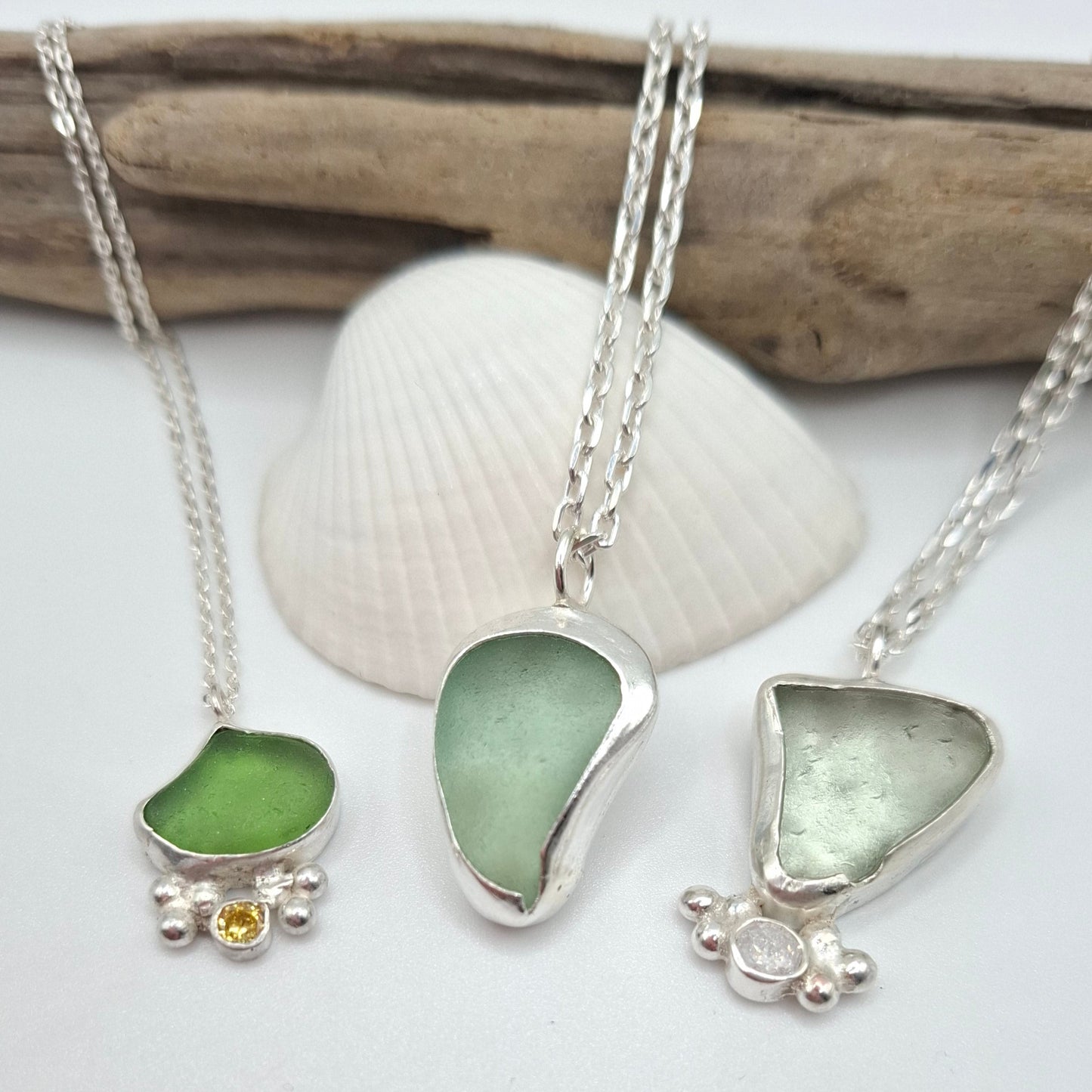 Dinky green seaglass pendant with yellow cubic zirconia
