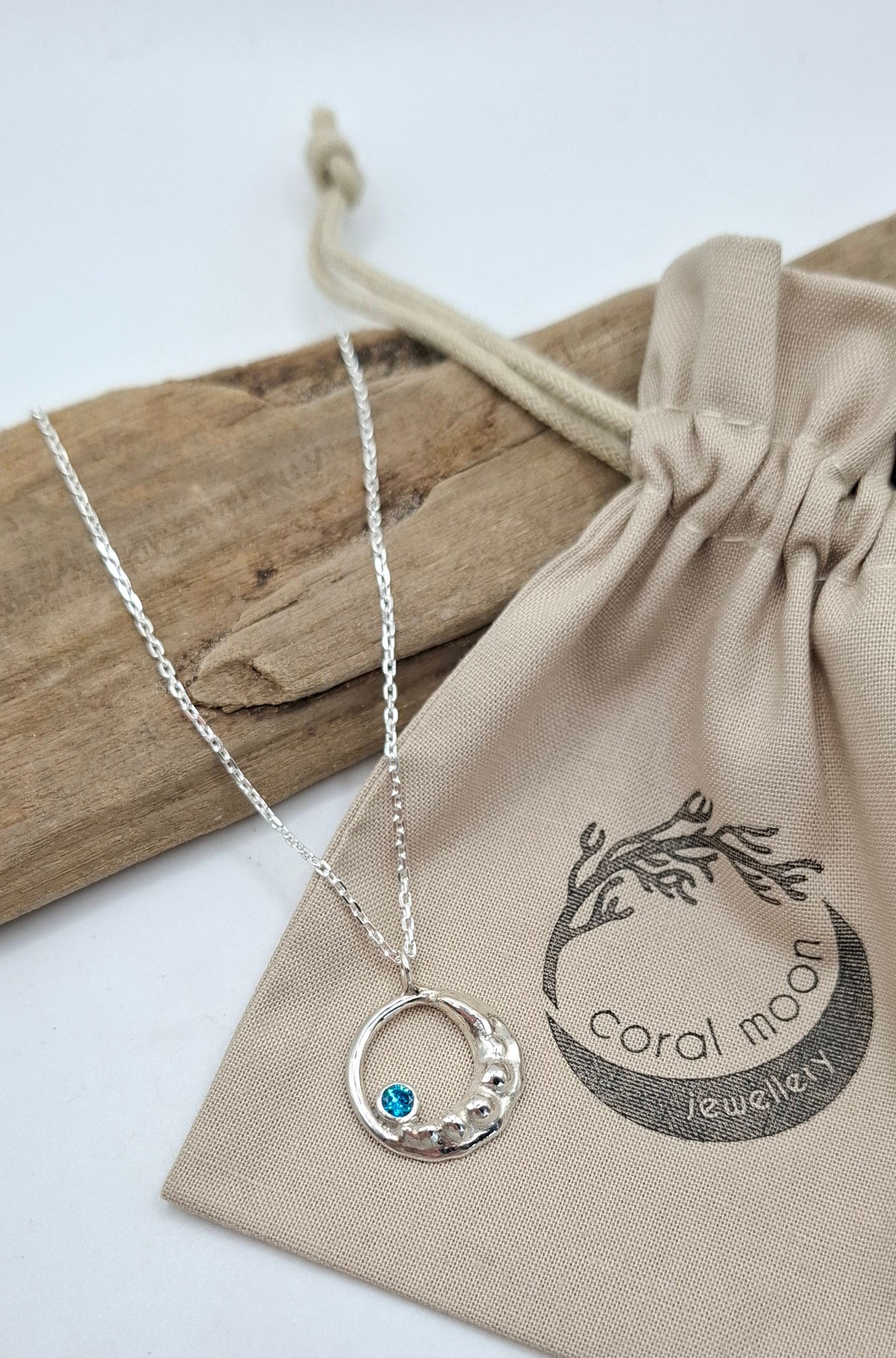 Silver Waxing Crescent Moon with aquamarine cubic zirconia | Coral Moon Collection