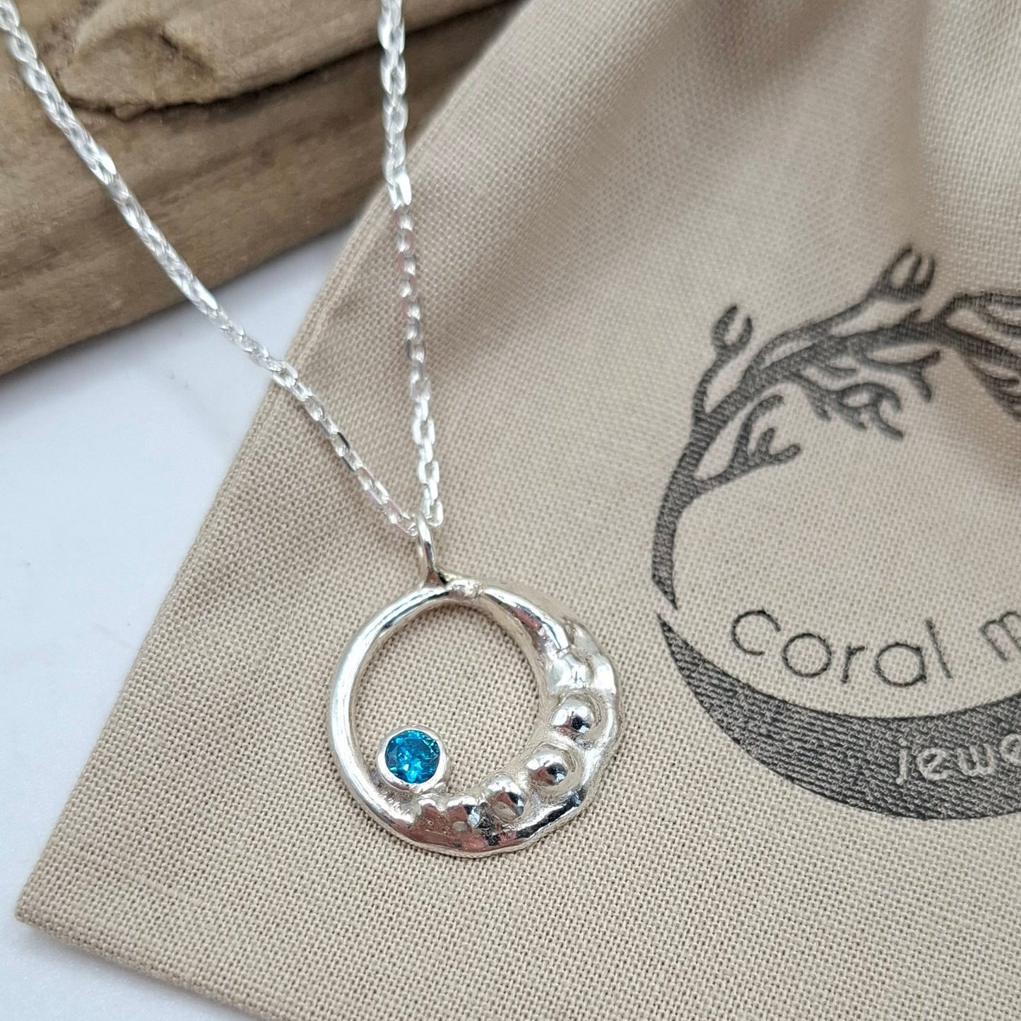 Silver Waxing Crescent Moon with aquamarine cubic zirconia | Coral Moon Collection