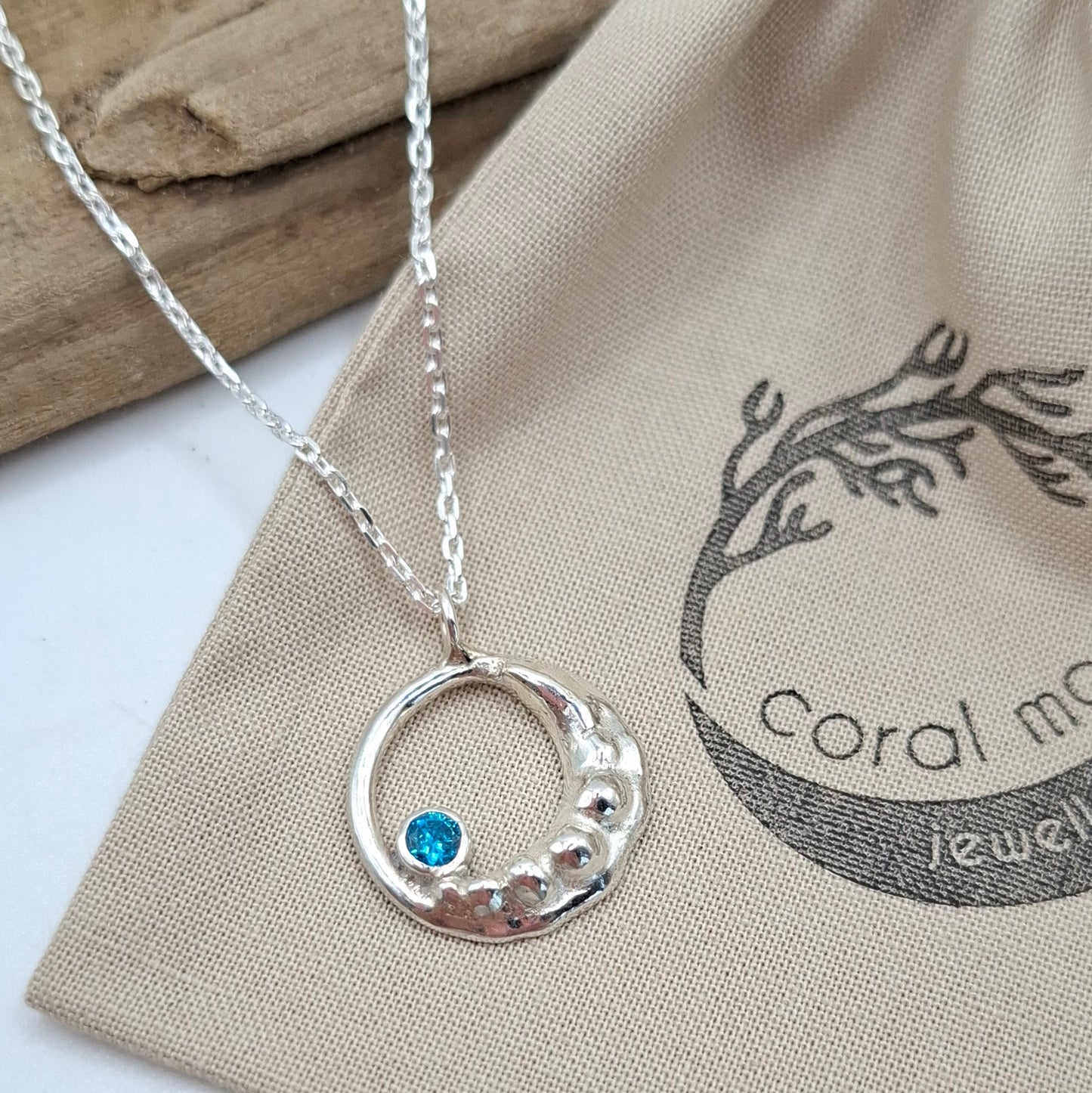 Silver Waxing Crescent Moon with aquamarine cubic zirconia | Coral Moon Collection
