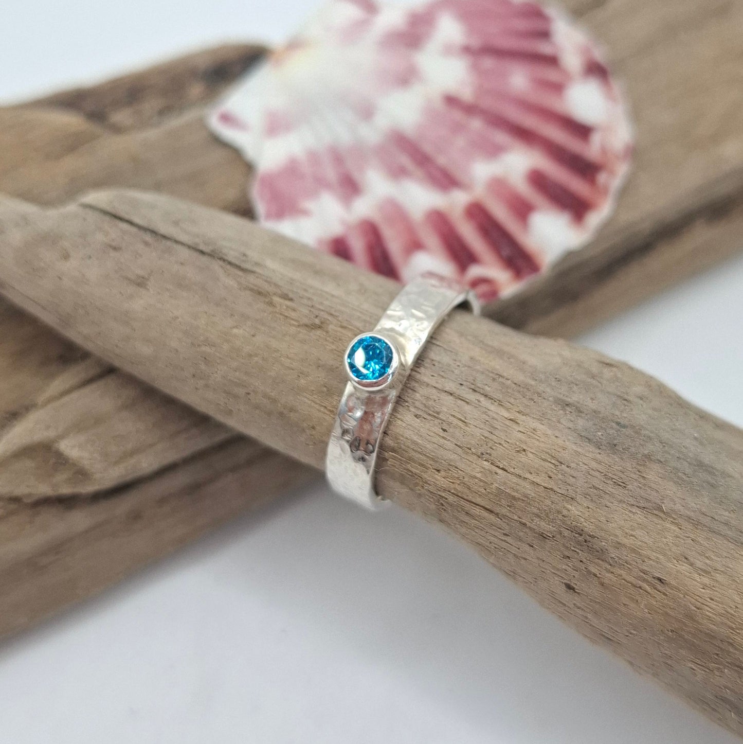 Hammered textured sterling silver ring with aqua cubic zirconia | Ocean-Inspired Handmade Jewellery