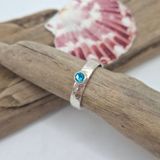 Hammered textured sterling silver ring with aqua cubic zirconia | Ocean-Inspired Handmade Jewellery