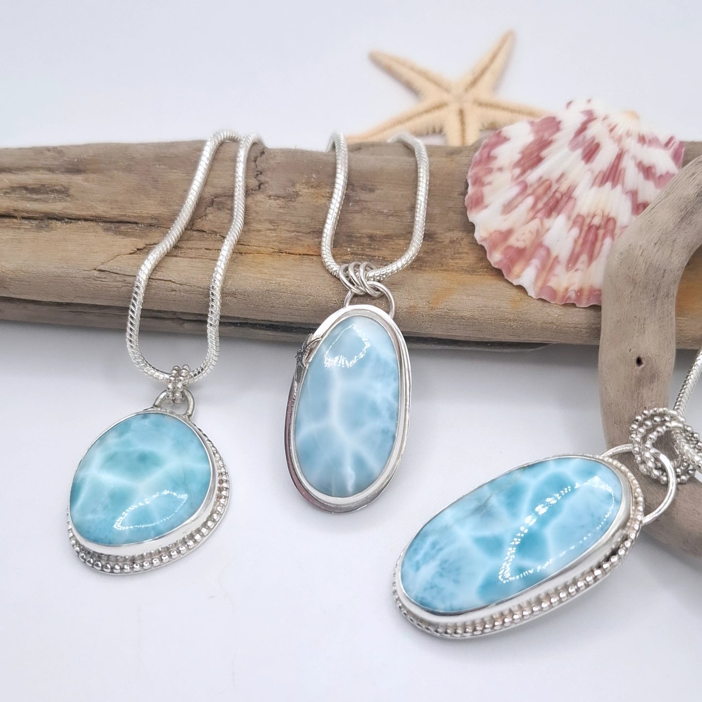 Large hallmarked larimar pendant with silver accents