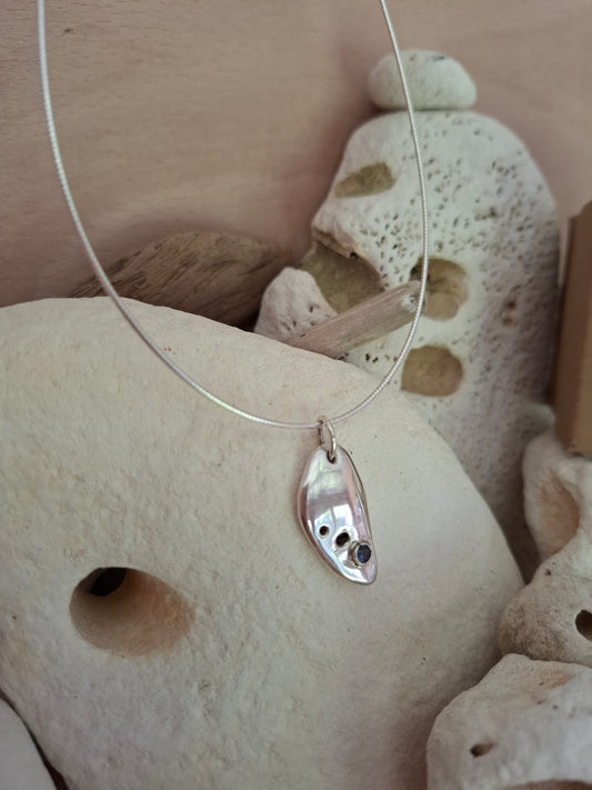 Silver and tanzanite coloured cubic zirconia pebble pendant and neck wire