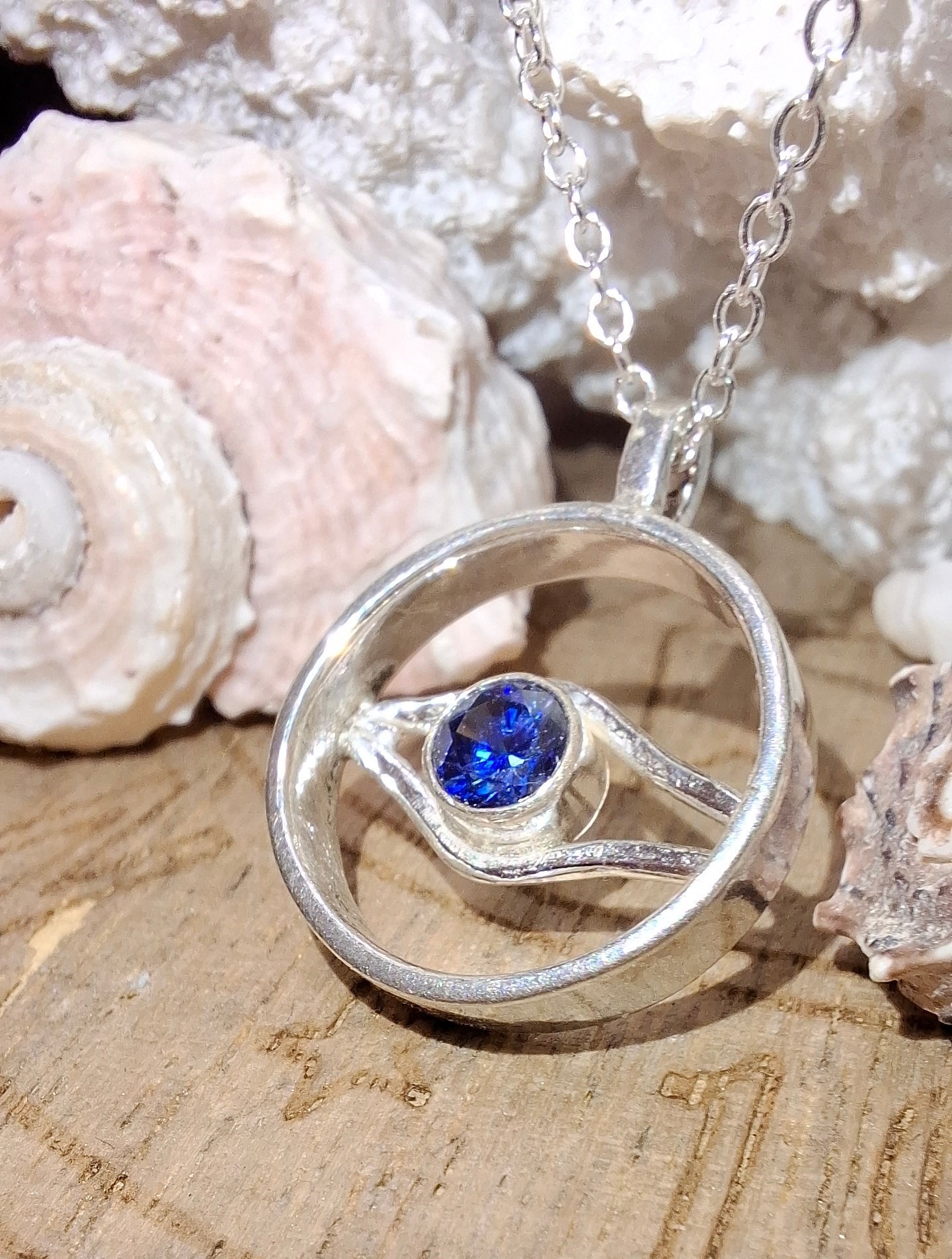 Silver and Tanzanite Cubic Zirconia Wave and Evil Eye Circle inspired Pendant