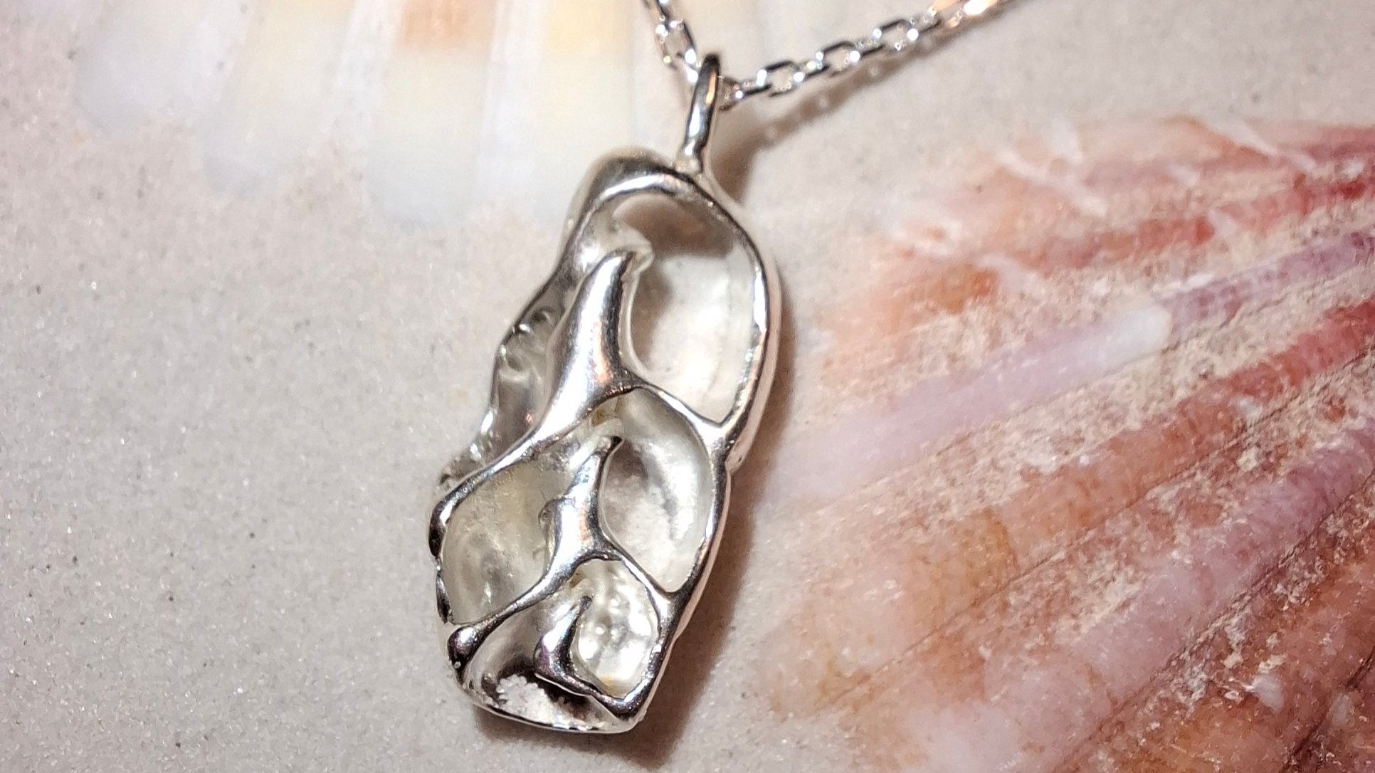 Cast silver seashell pendant with necklace