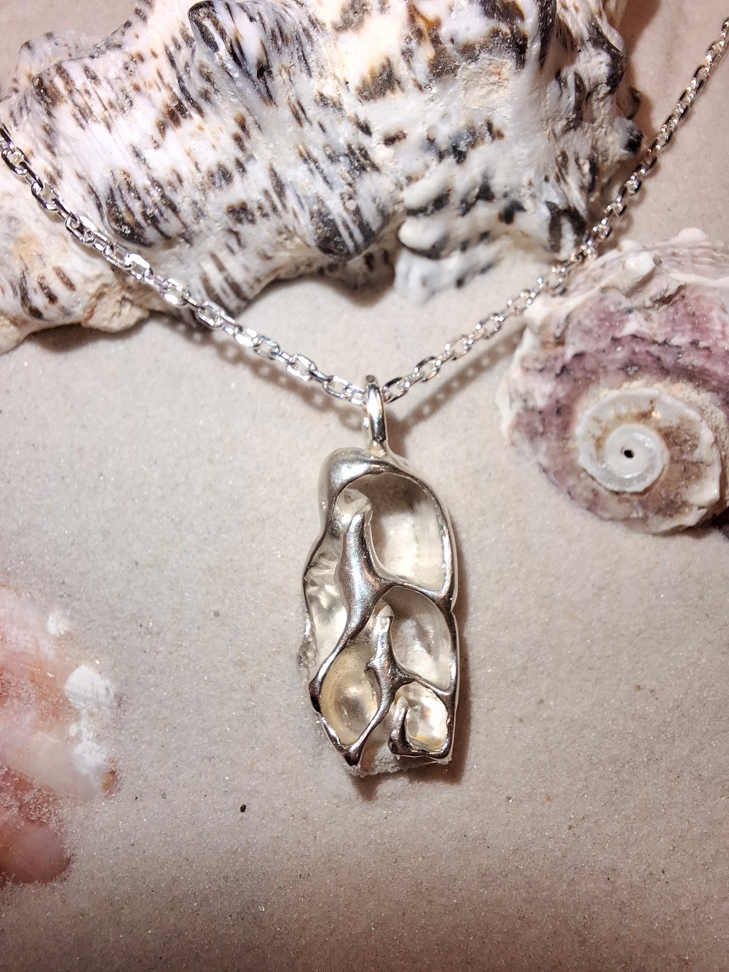 Cast silver seashell pendant with necklace