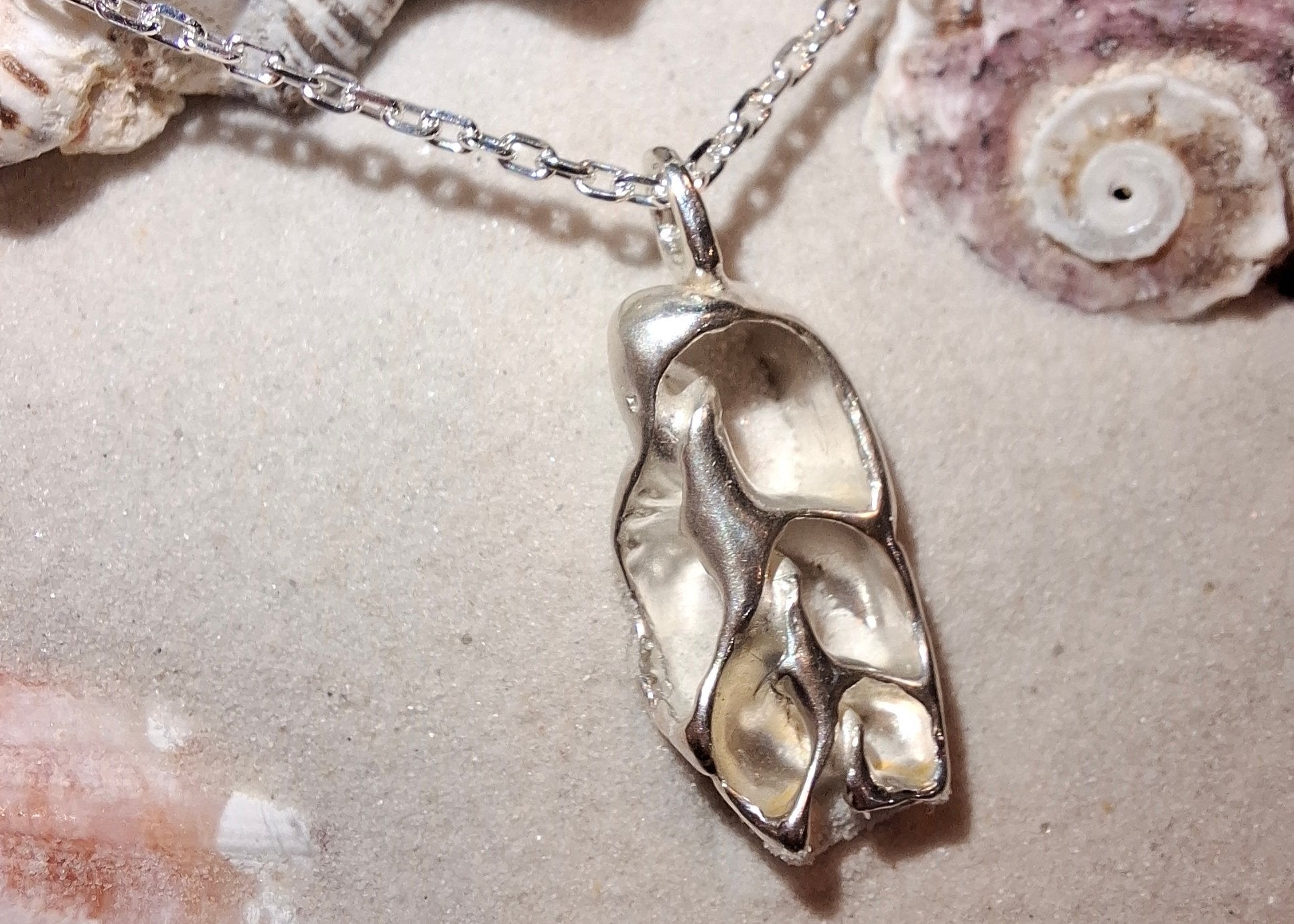 Cast silver seashell pendant with necklace