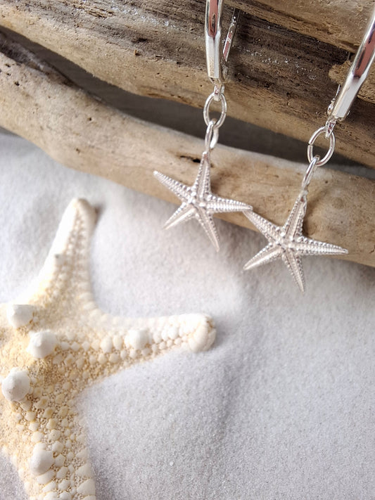 Cast silver starfish dangly earrings