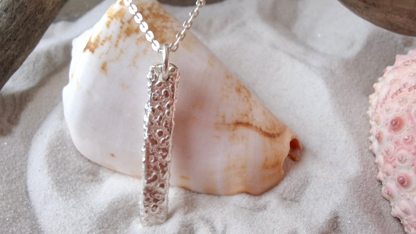 Handmade sterling silver seabed textured pendant