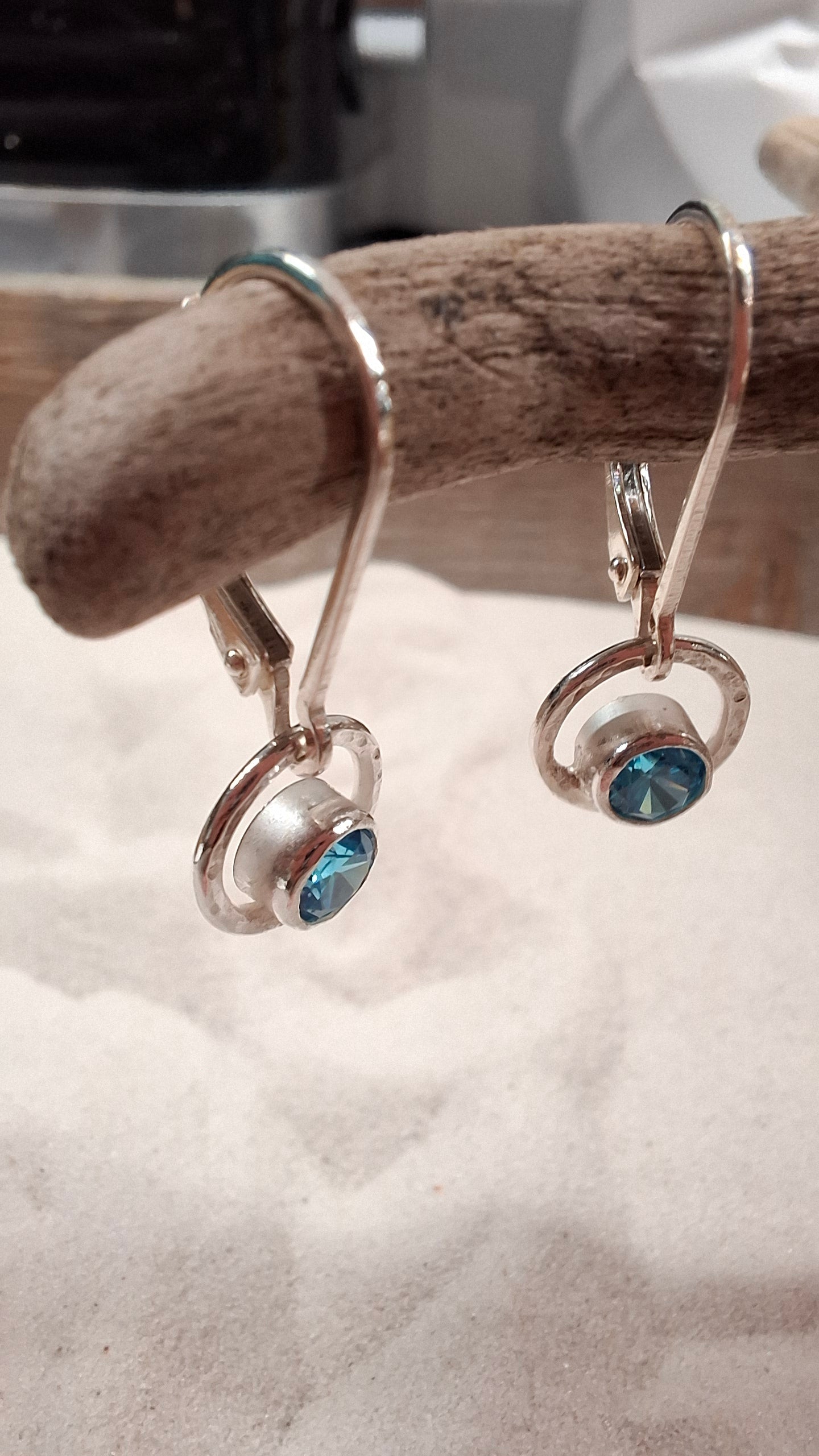 Silver hammered circle aquamarine cubic zirconia dangly earrings