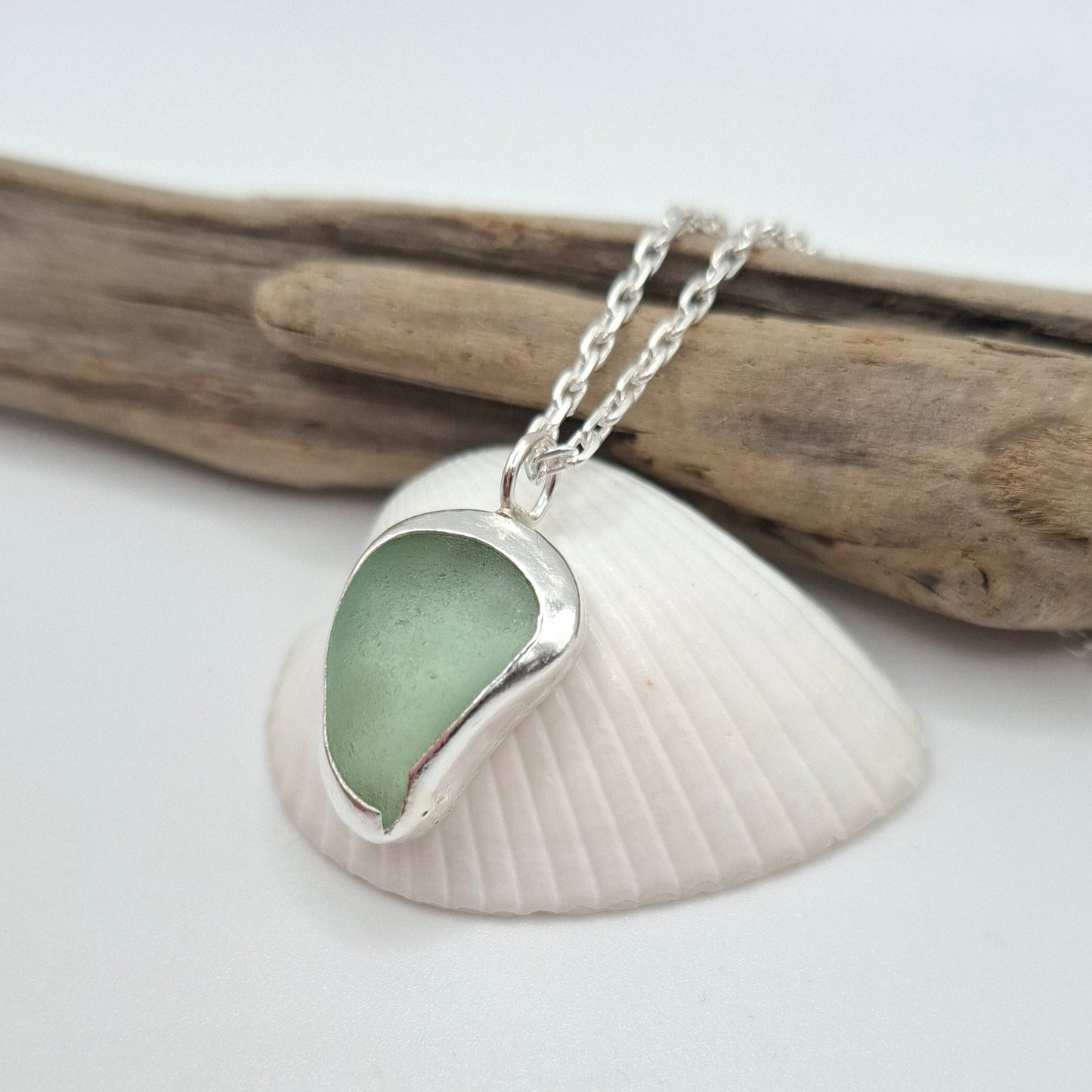 Teardrop shaped pale green seaglass pendant