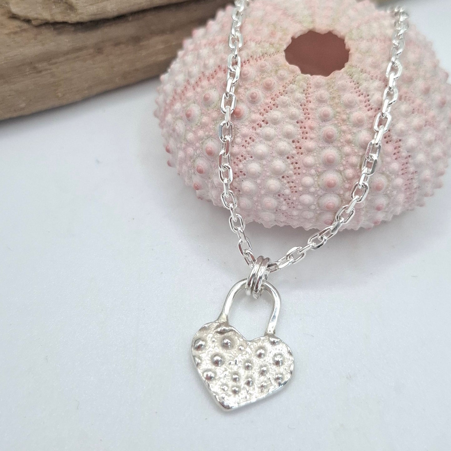 Silver sea urchin shell heart padlock style pendant | Ocean-Inspired Handmade Jewellery
