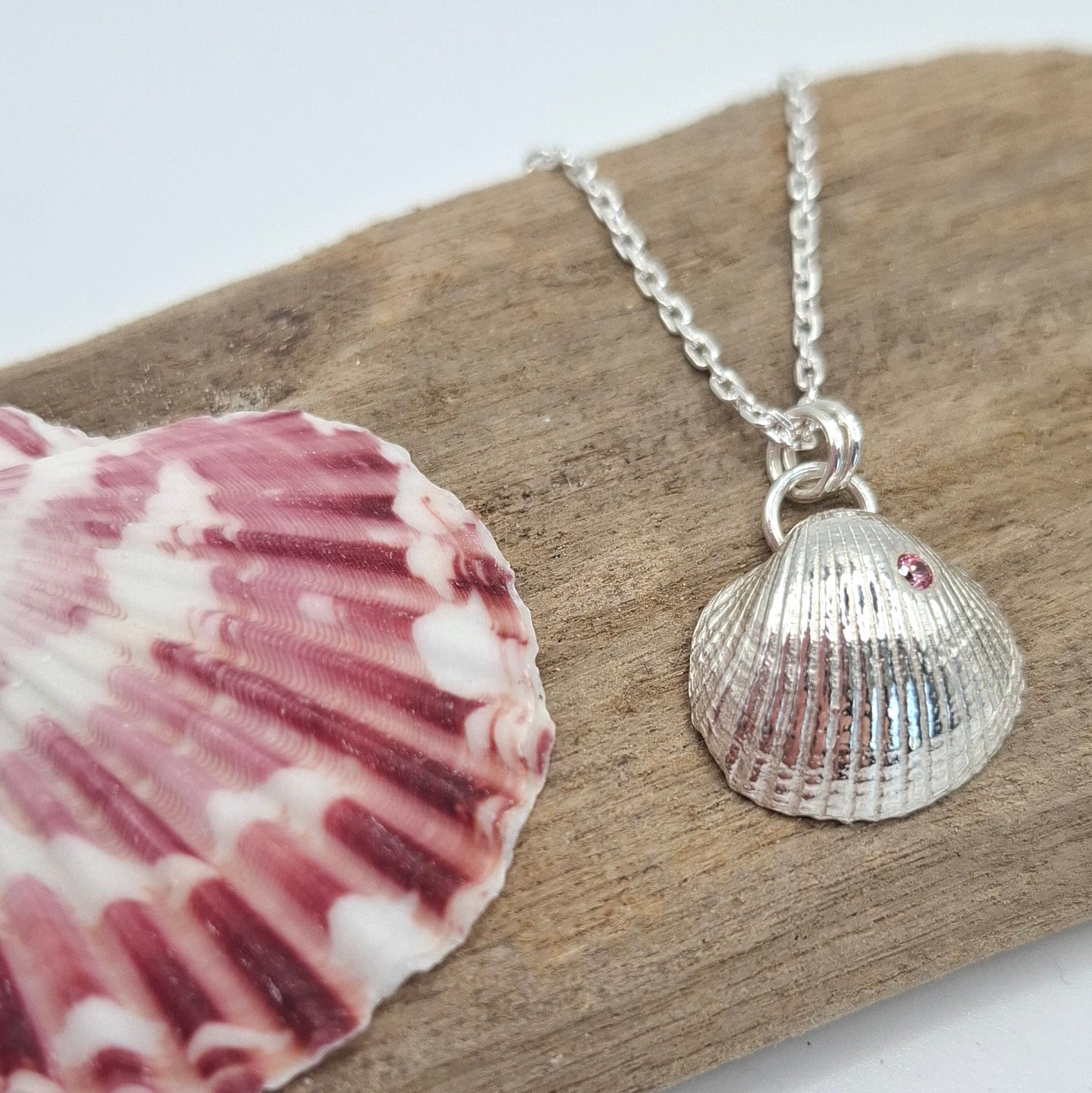 Silver cockle shell with rose pink cubic zirconia | Ocean-Inspired Handmade Jewellery