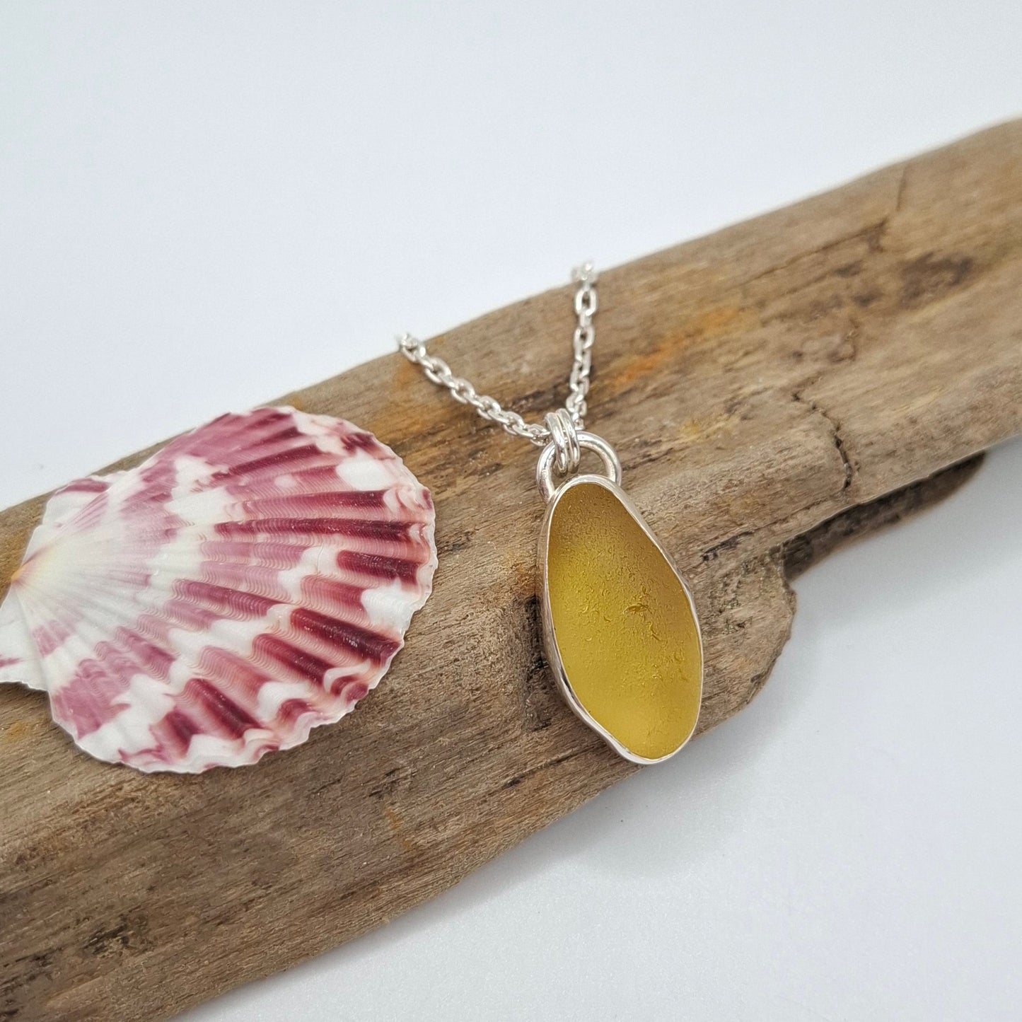 Large Channel Islands rare yellow seaglass pendant on necklace by Shelley Ide Jewellery, showcasing a smooth, vibrant seaglass piece.