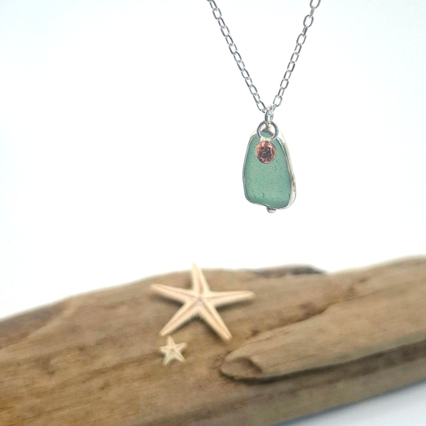 Channel Islands green seaglass pendant with copper ball accent