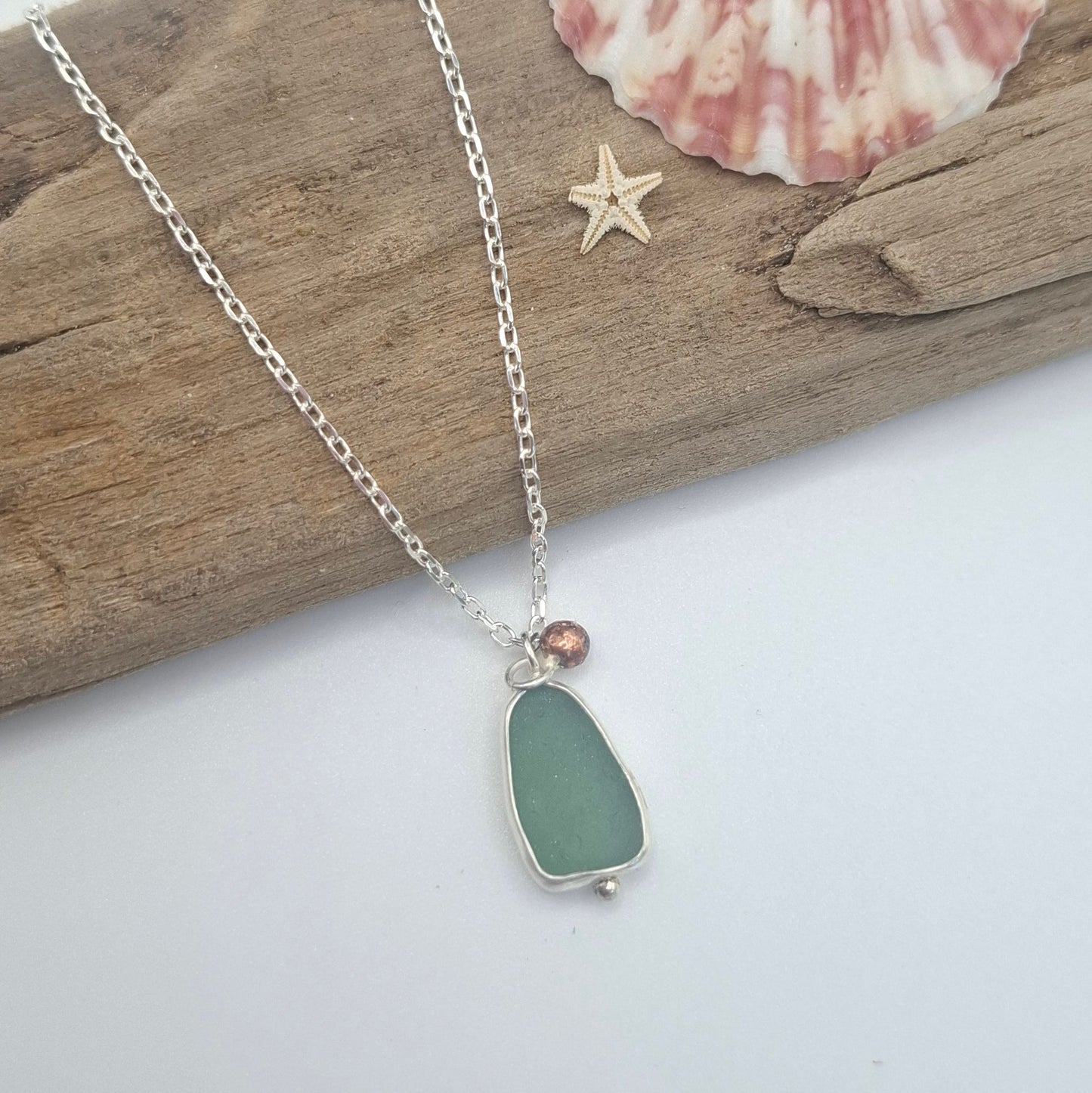 Channel Islands green seaglass pendant with copper ball accent