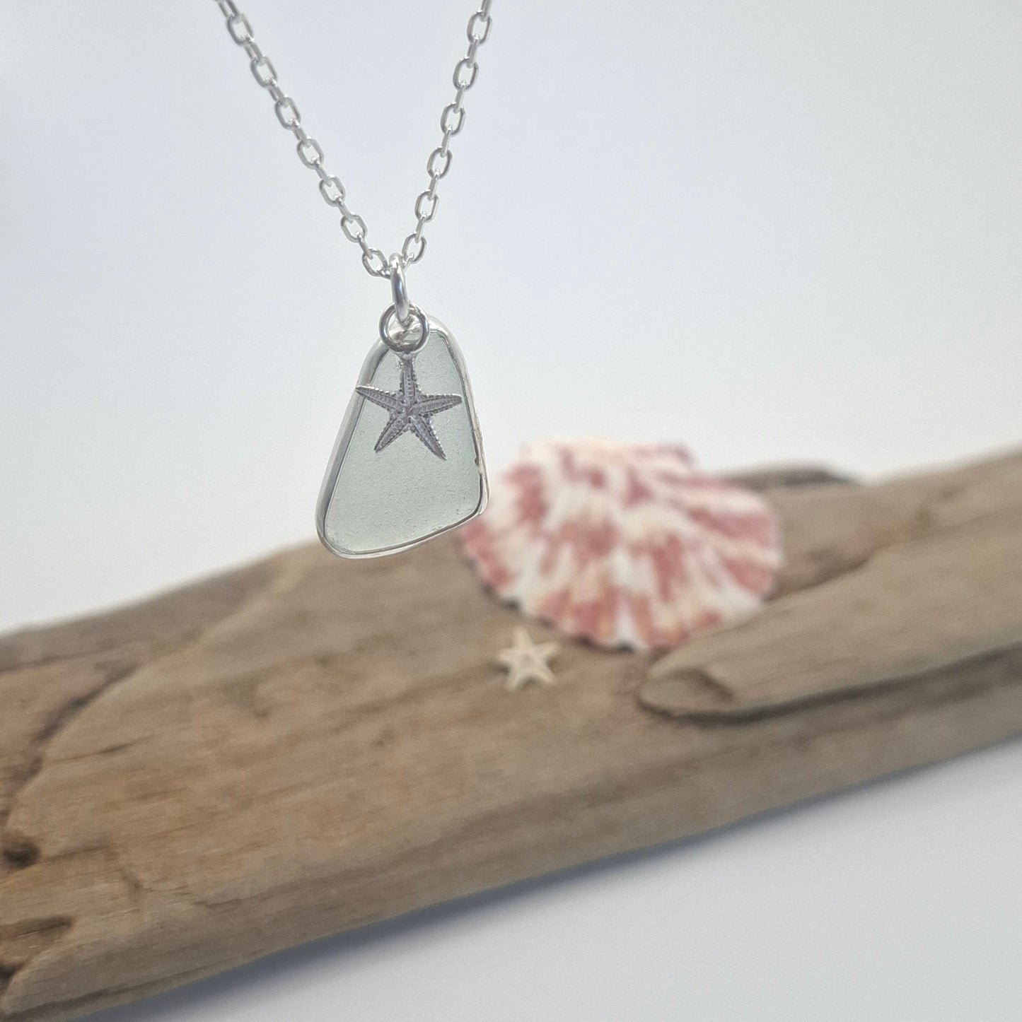 Channel Islands light aqua blue seaglass pendant with silver starfish charm