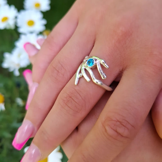 Coral inspired sterling silver & aquamarine cubic zirconia ring.