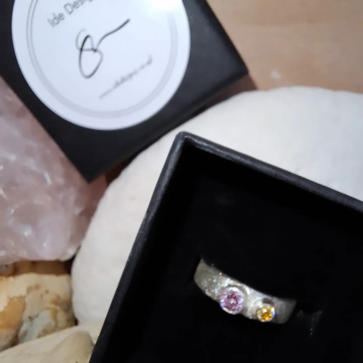 Textured silver ring with rose pink and yellow cubic zirconias