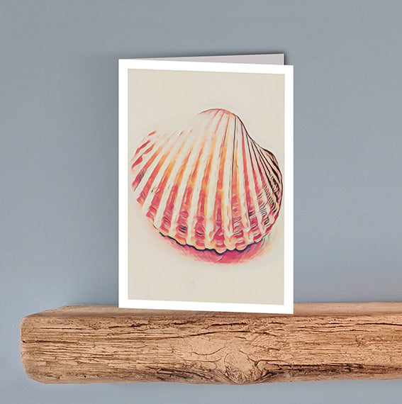 A vintage style print on a blank greeting card of a large cockle shell on a cream background.