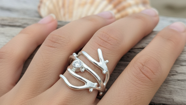 Adjustable seaweed inspired silver ring with cubic zirconia