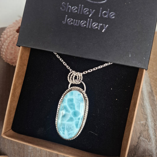 Large hallmarked larimar pendant with silver accents